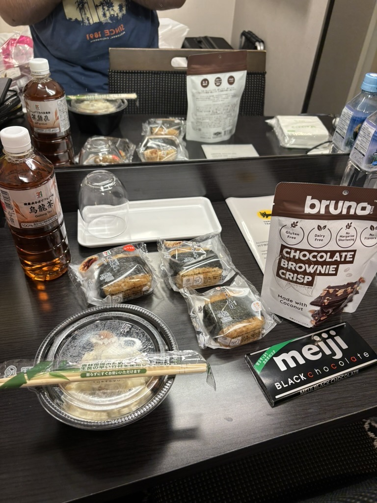 Late dinner spread with cream chicken and onigiri